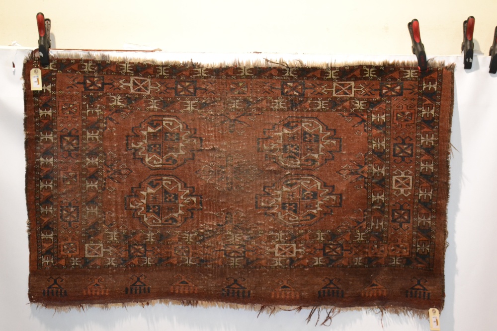 Collection of seven rugs including a Tekke Turkmen chuval face, Turkmenistan, late 19th/early 20th - Image 2 of 4