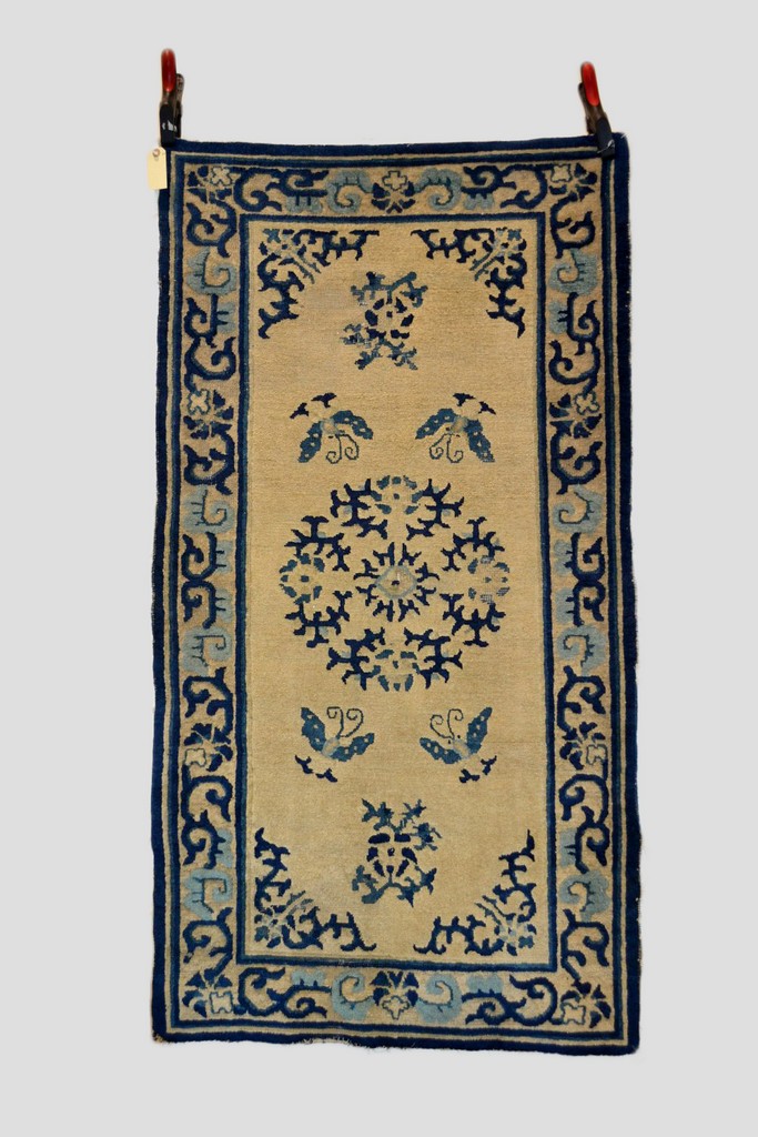 Baotou-Suiyuan rug, north west China, early 20th century, 4ft. 10in. x 2ft. 8in. 1.47m. x 0.81m.