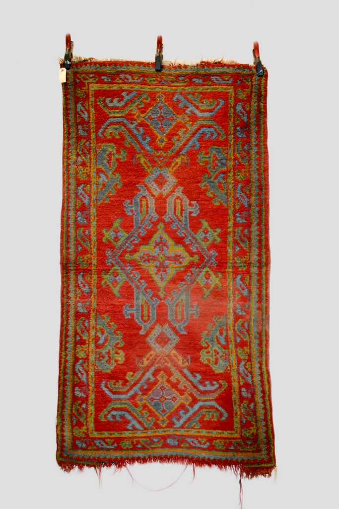 Two Ushak rugs, west Anatolia, about 1910, one 6ft. x 5ft. 2in. 1.83m. x 1.58m. Overall wear with