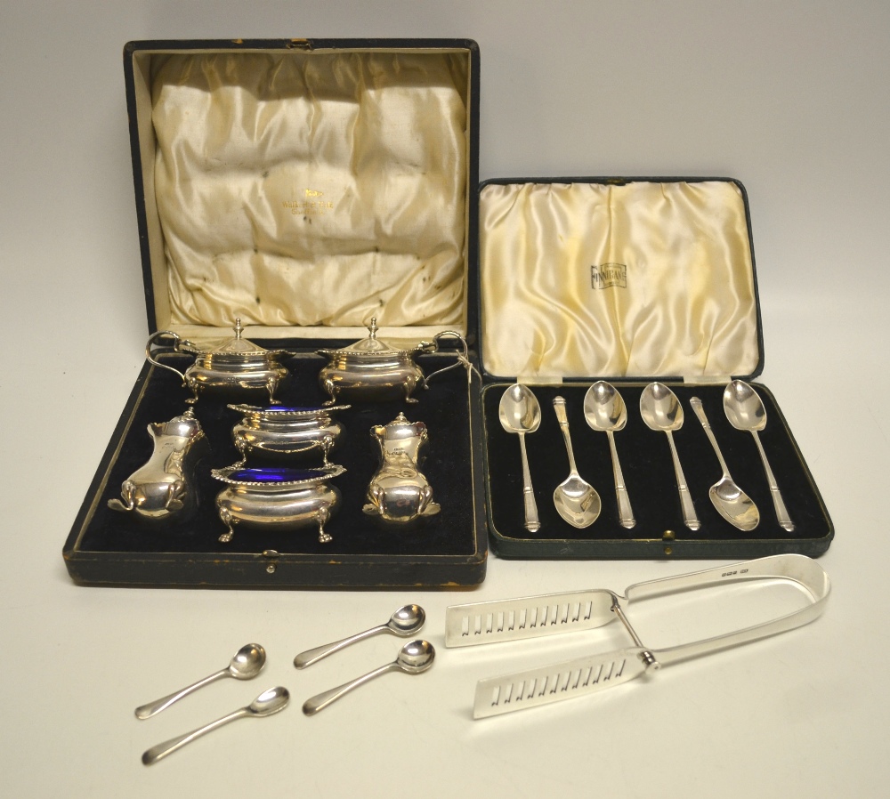 A silver double condiment set, with gadroon shell anthemion borders to the rectangular ogee sides