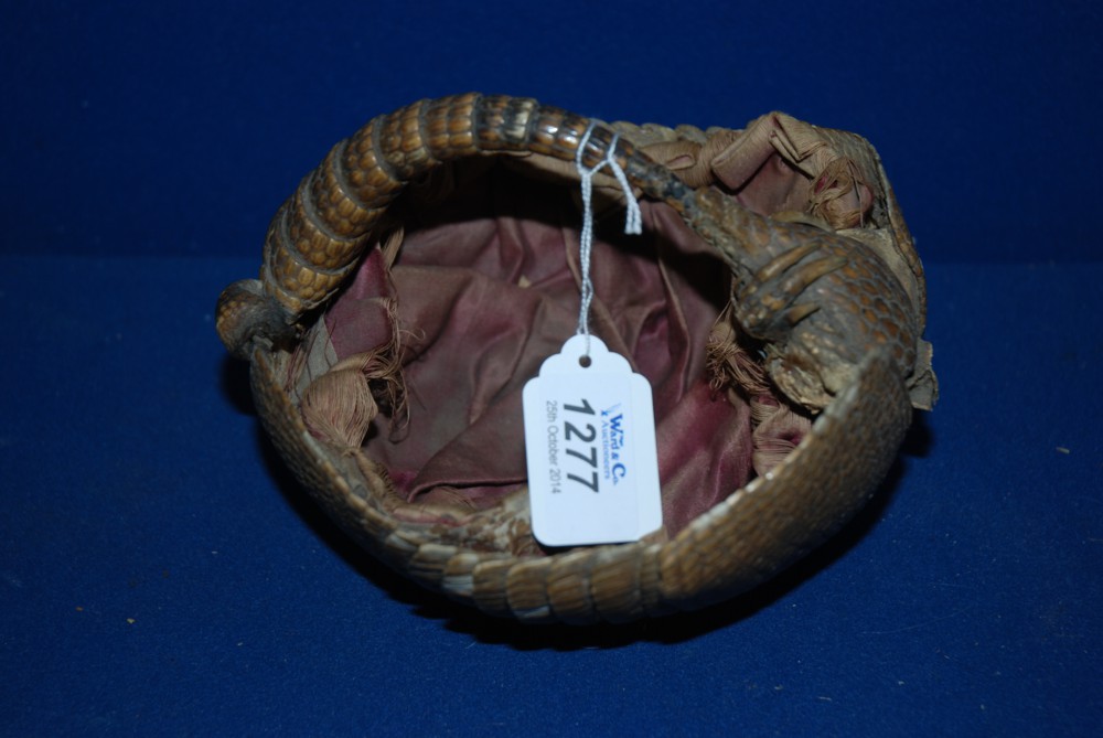A scarce antique South American armadillo pangolin skin sewing basket, c. 1900 With original faded