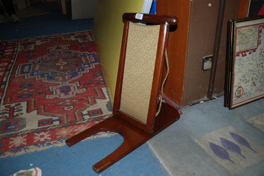 A Mahogany upholstered Leg Rest