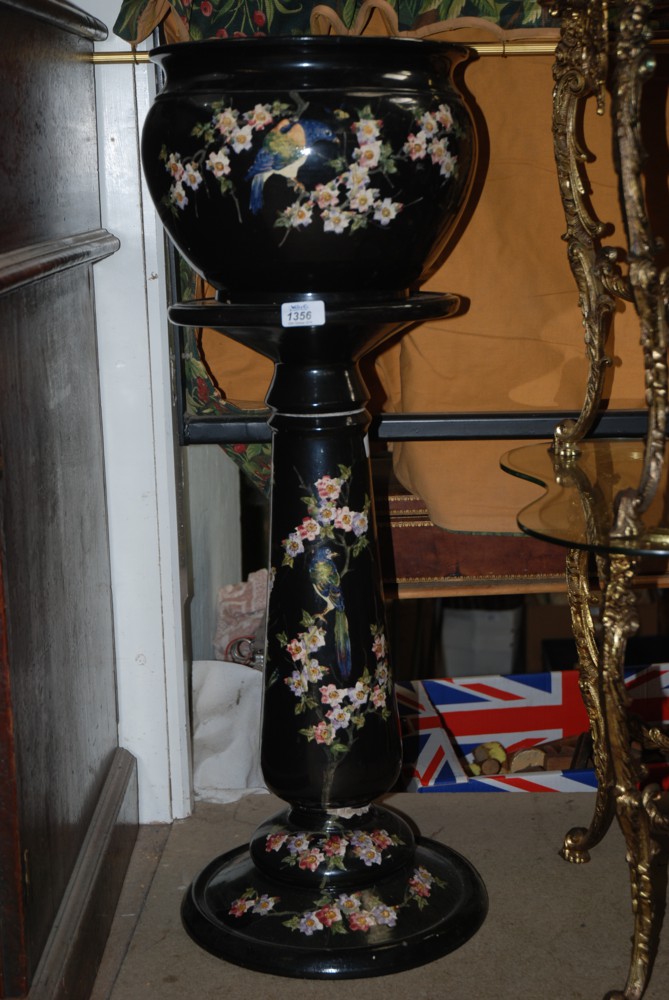 A decorated Jardiniere (stand repaired), black with floral and bird design 34" high