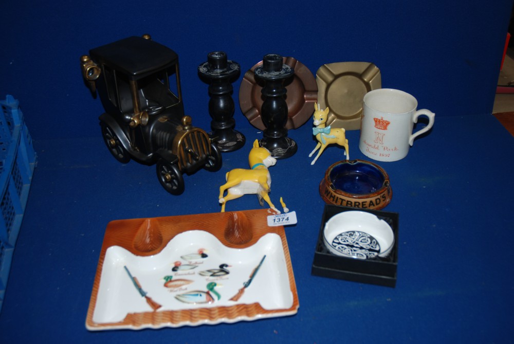 A Royal Doulton ''Whitbread'' Ashtray, china Babycham figure and a similar in plastic, both a/f, two