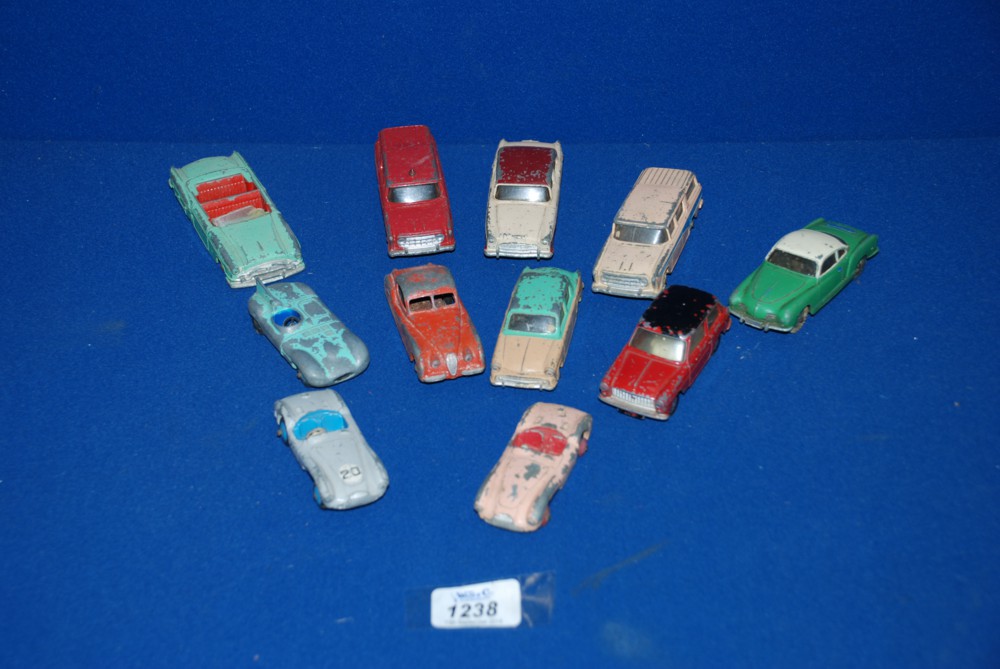 A quantity of Dinky vehicles including Jaguar type 'D', Aston Martin, Volkswagen Karmann Ghia,