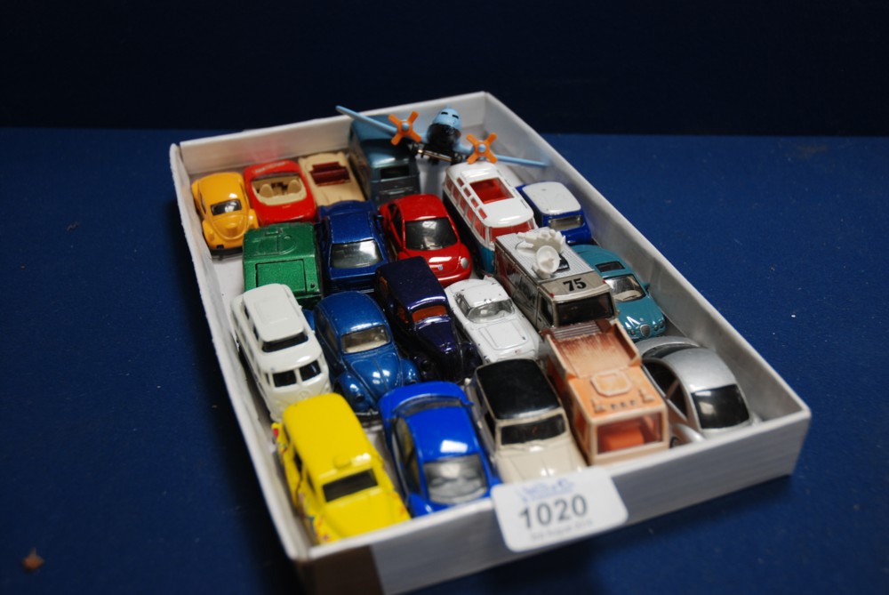 A quantity of Toy Cars including a VW delivery Van, a VW Camper Van, V.W. Cars, Minis, etc.