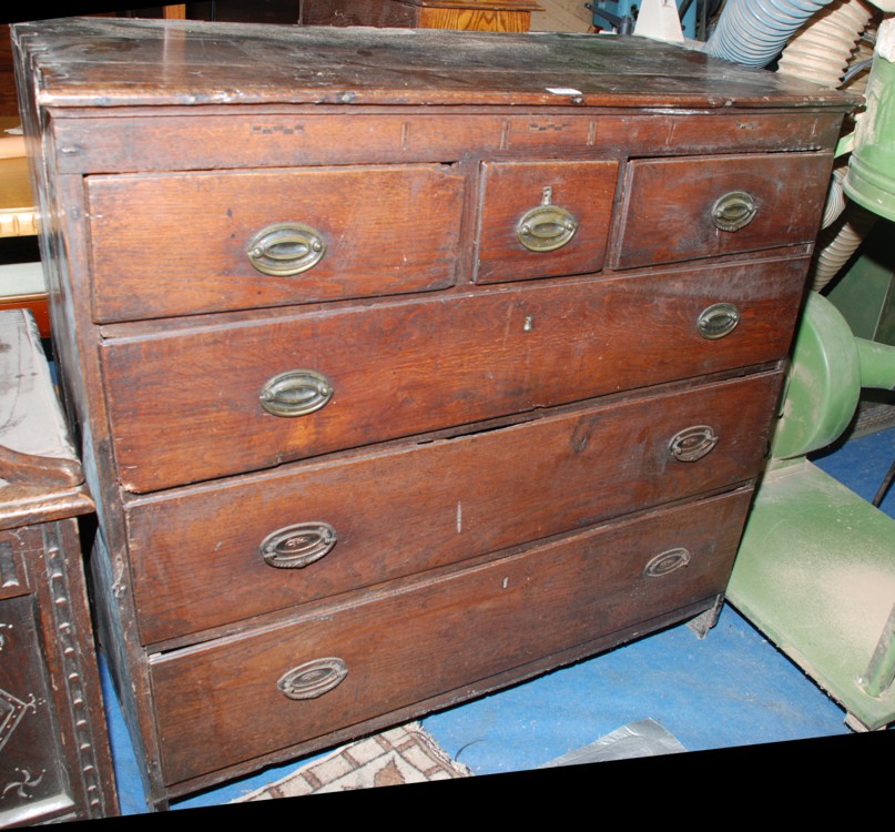 A circa 1700 Oak Chest of Drawers of crude dovetail construction, having two plank top, basic