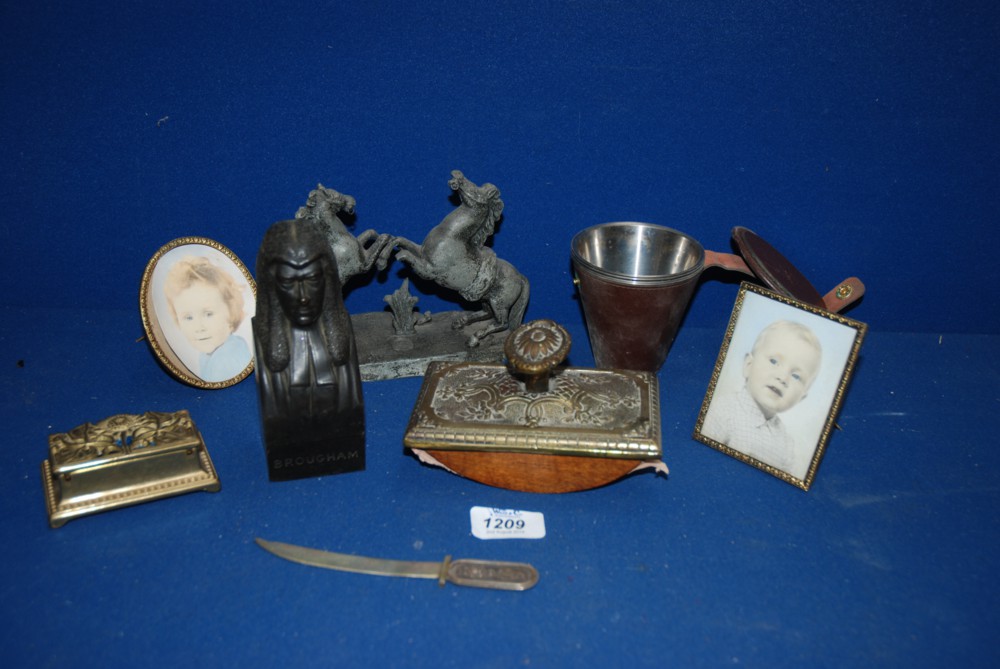 A quantity of miscellanea including brass blotter, paper knife and stamp holder, cast figure of