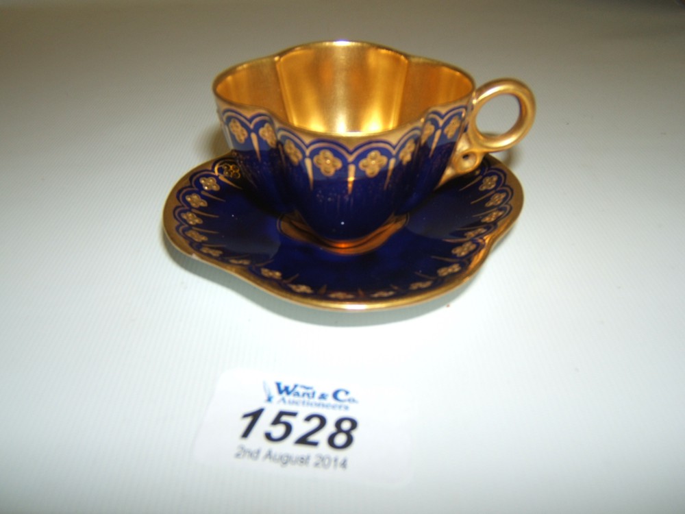 A fine Coalport 'jeweled' miniature Cup and saucer, c. 1900. of quatrefoil form with raised