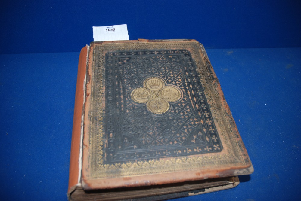 An illustrated leather covered Bible, cover a/f with binding repairs