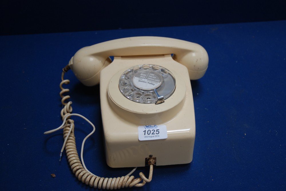 A white dial up Telephone