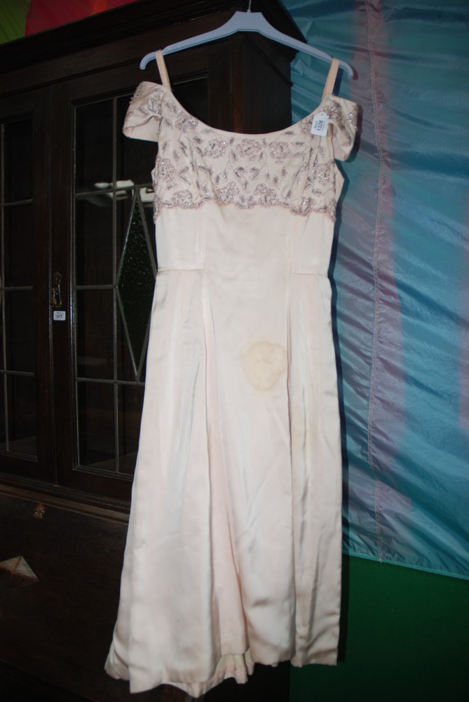 A pale pink silk satin 1950's scoop necked Dress with beaded bodice (stain to front of skirt)