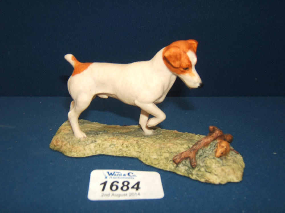 A Border Fine Arts figure of a Jack Russell looking at a mouse