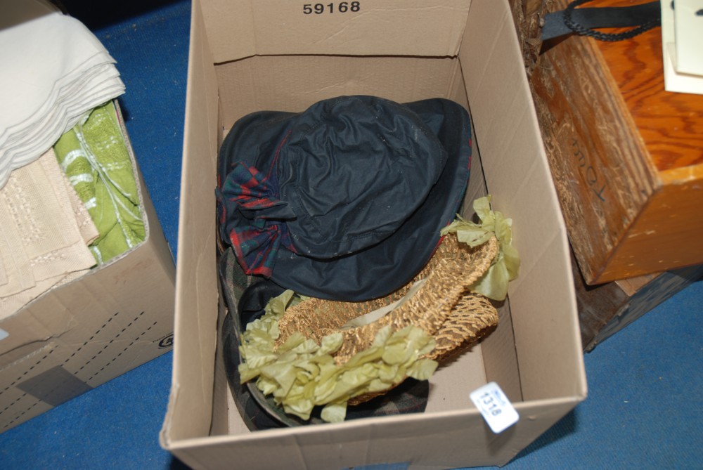 A box of miscellaneous Hats