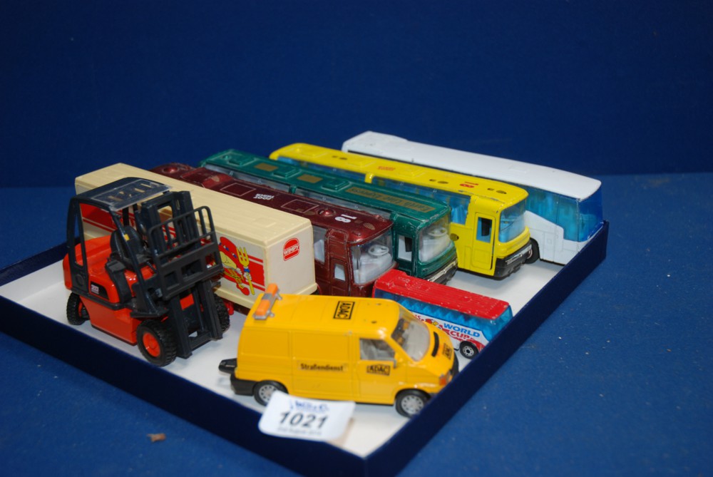 A quantity of Toy Buses, a Nissan 20 Fork-Lift Truck etc.