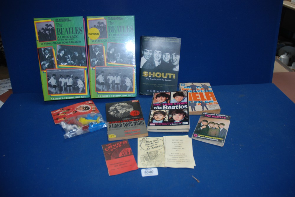 A mixed quantity of Beatles memorabilia including early booklets, plastic models, unused Cavern Club