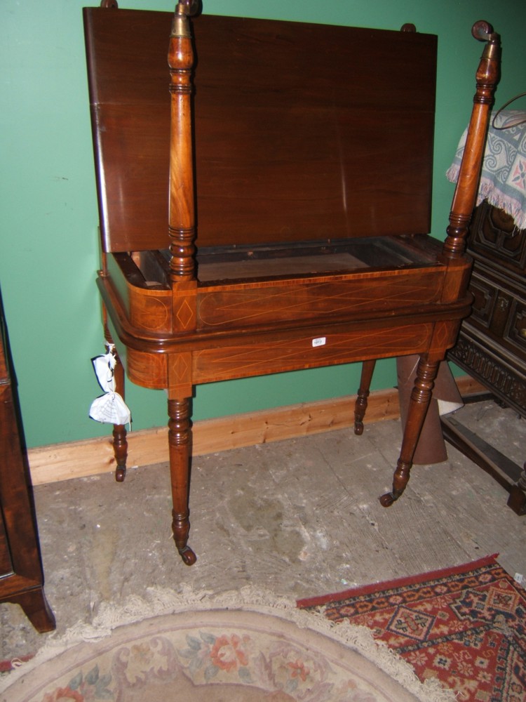 A good Regency Mahogany extending dining Table, double end with moulded rectangle tops with curved