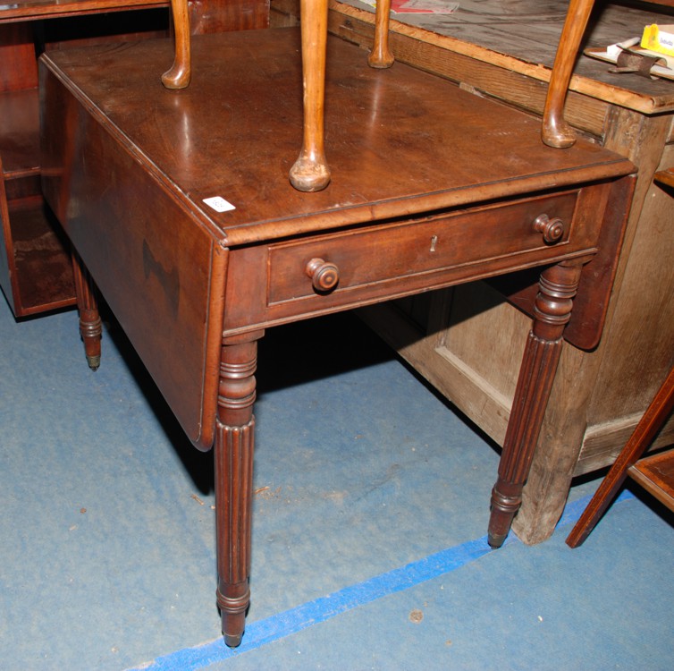 An early 19th c. Mahogany Pembroke Table, bull nose moulded edge top and leaves, single Oak lined,