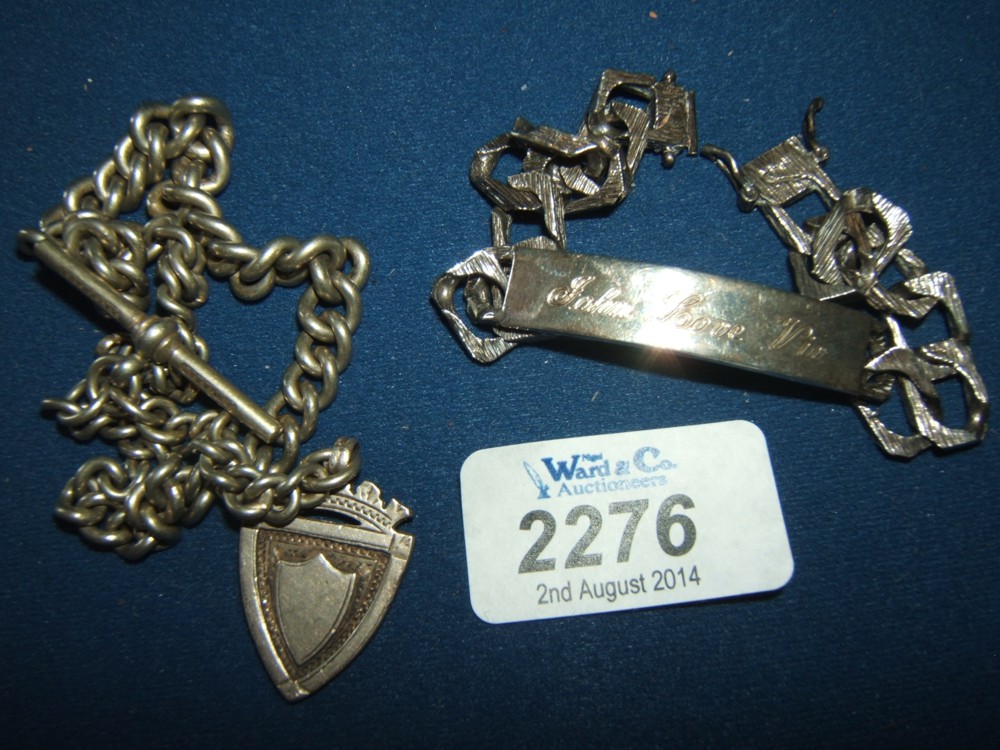 A Silver Identity Bracelet and white metal Watch Chain with medal