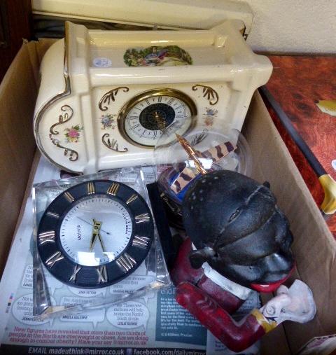 Two clocks including a Molnija made in USSR, a cast iron black boy money box and a Tornado model