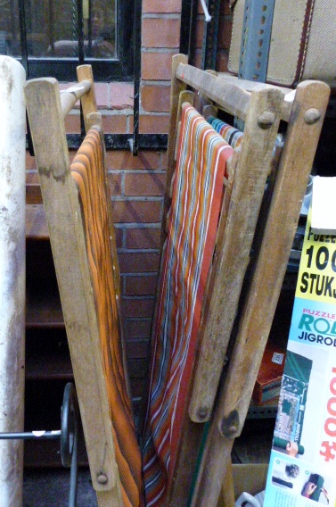 Three vintage wooden deck chairs