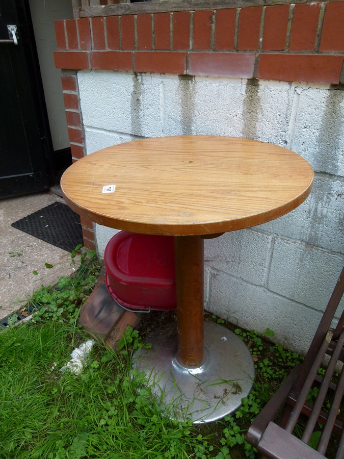 Wooden garden table with steel base
