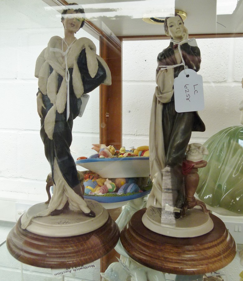 Two Capodimonte hand painted and signed figures, 24cm H