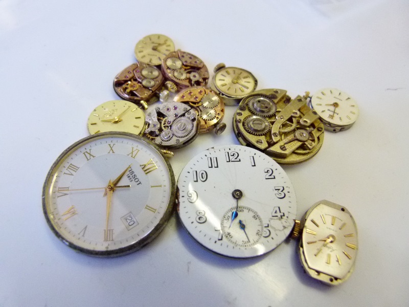 Various watch movements including Omega and Tissot