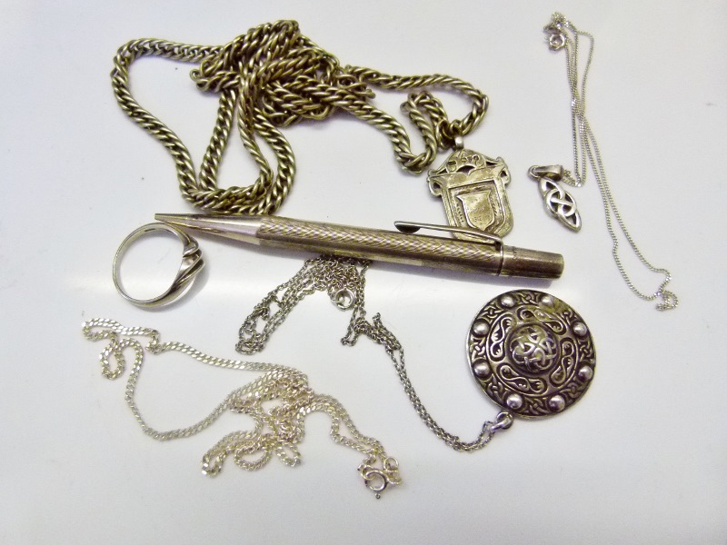 Mixed silver items with a white metal chain