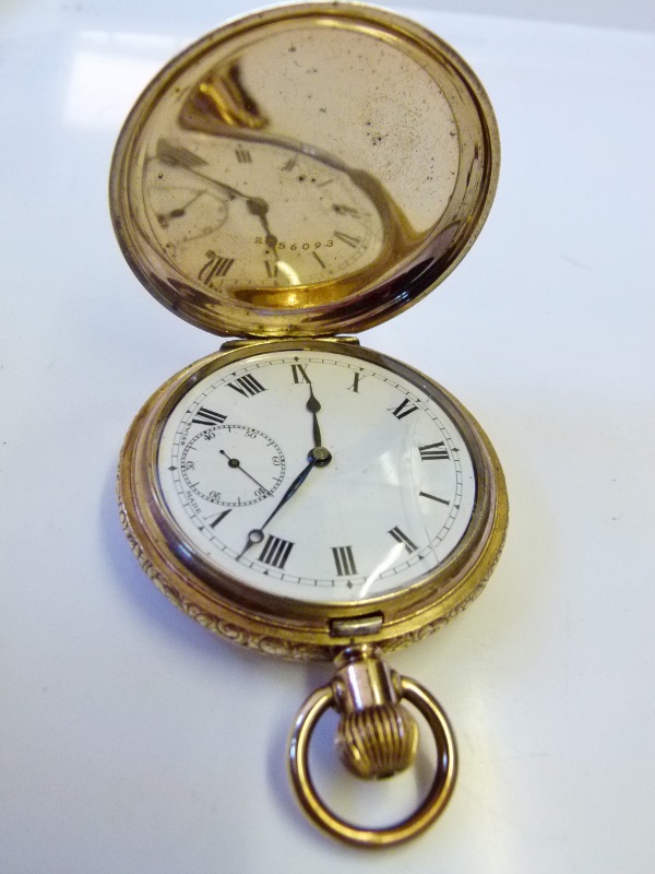 Yellow metal crown wind full hunter pocket watch