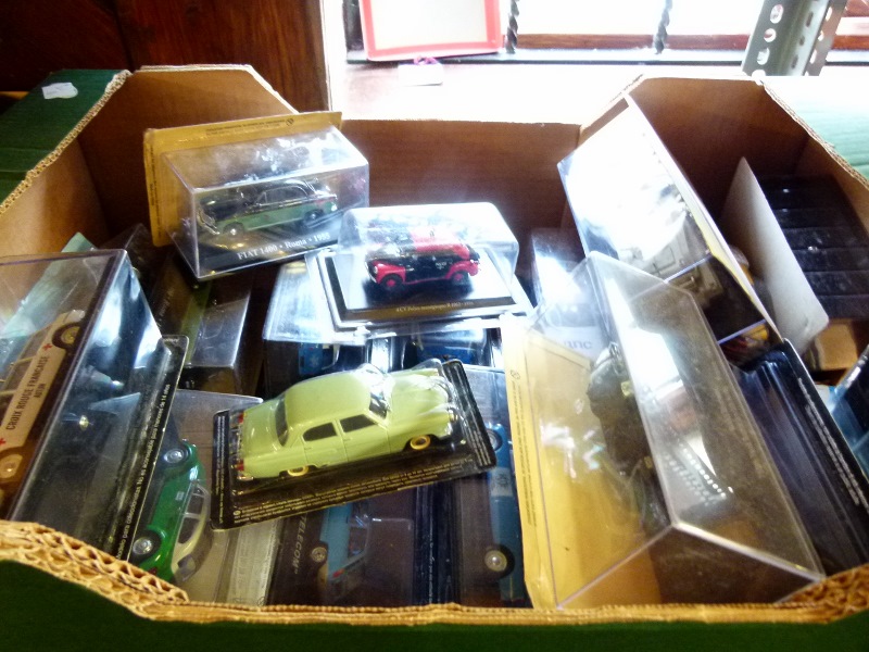 Quantity of boxed diecast model cars