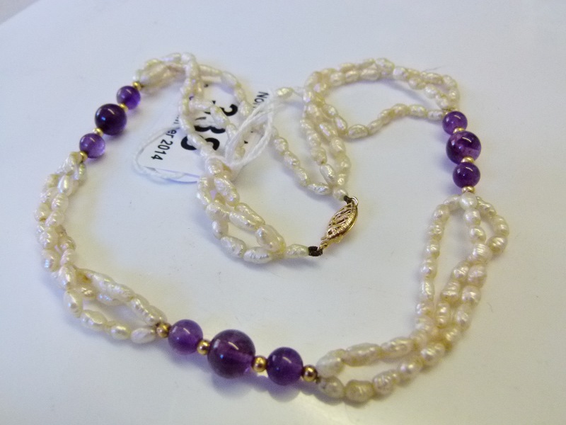 Freshwater pearl and amethyst necklace with 14ct gold clasp