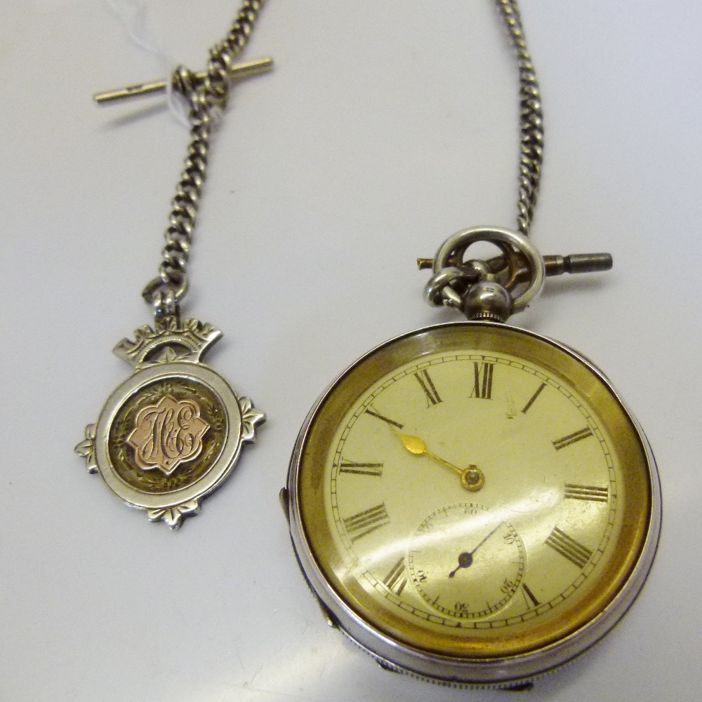 925 silver key wind pocket watch on graduated silver Albert chain with T bar and fob