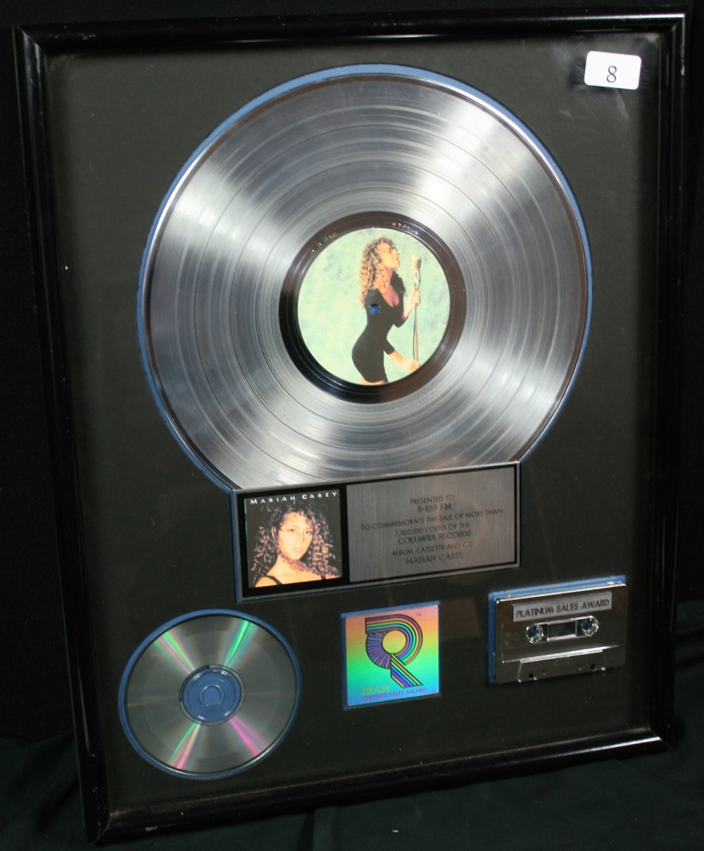 MARIAH CAREY PLATINUM AWARD - RIAA award presented to B-100 FM to commemorate the sale of more than