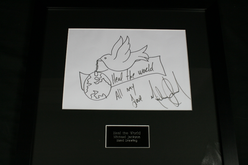 MICHAEL JACKSON - signed drawing in black marker pen of a dove carrying the world with the
