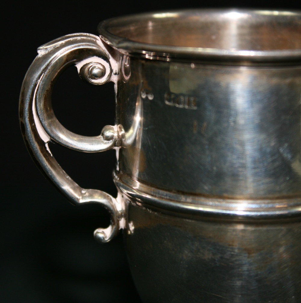 JOHN SMYTH - A sterling silver cup on wooden base by John Smyth of Dublin. The cup is fully - Image 2 of 3