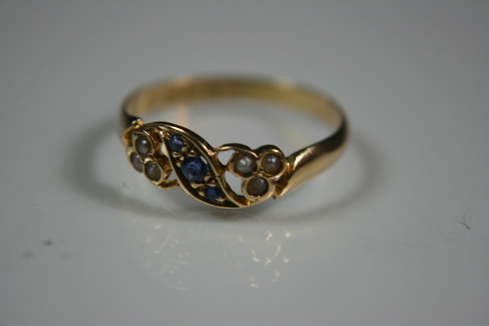 18ct GOLD VICTORIAN  RING - set with 3 x sapphires in a central wave with 3 x seed pearls to each