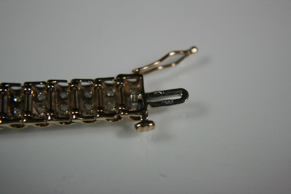 9ct DIAMOND BRACELET - attractive 9ct yellow gold bracelet with around 1.00ct of diamonds set in two - Image 3 of 3