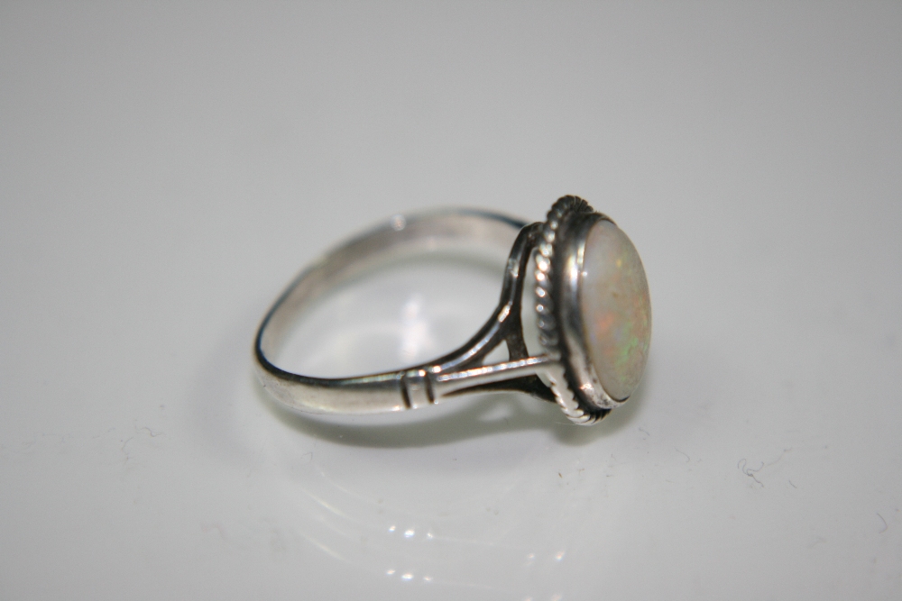 OPAL RING - A silver and opal ring with hallmarks for Birmingham 1954. Ring comes in vintage box. - Image 4 of 7