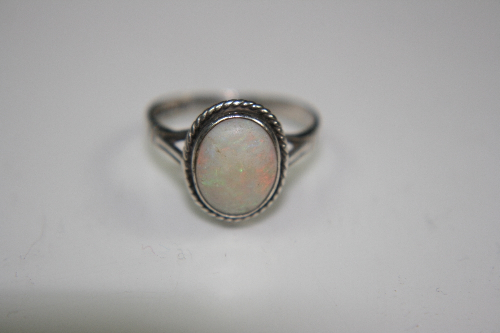OPAL RING - A silver and opal ring with hallmarks for Birmingham 1954. Ring comes in vintage box. - Image 3 of 7