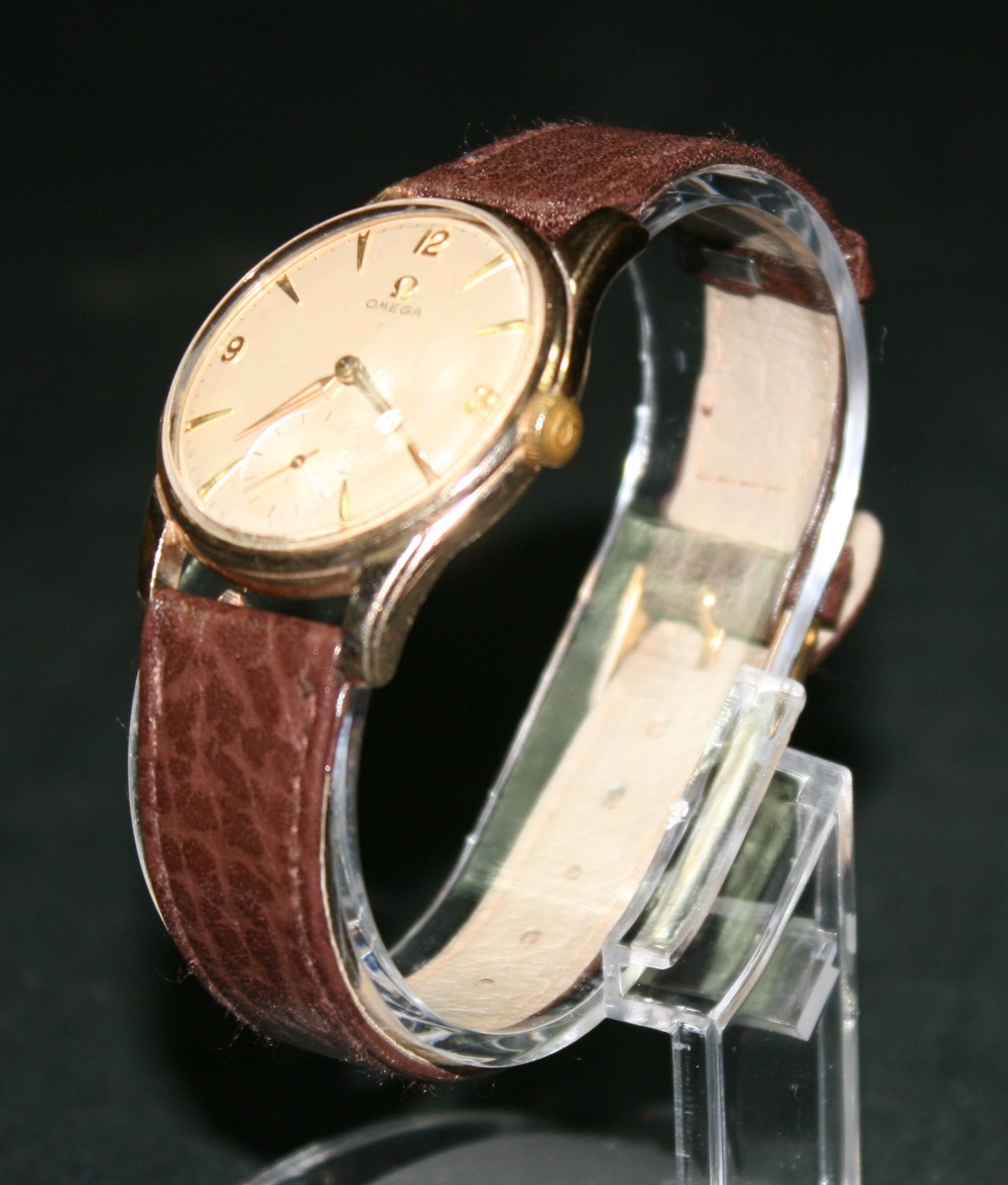 OMEGA - Omega gents manual wind wristwatch on replacement brown leather strap. The case is