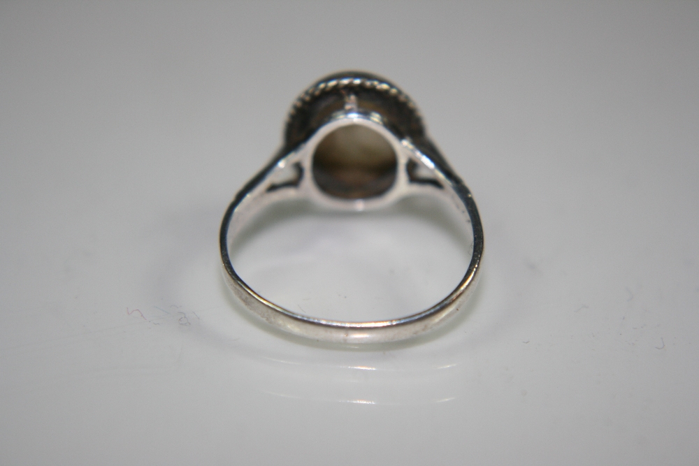 OPAL RING - A silver and opal ring with hallmarks for Birmingham 1954. Ring comes in vintage box. - Image 5 of 7