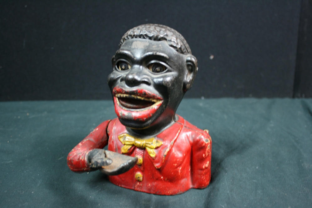MONEY BOX - A `Jolly Nigger - Little Joe` money box with yellow butterfly tie, believed to have