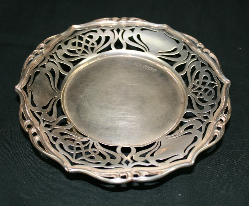 MAPPIN AND WEBB - A decorative pierced Bon Bon dish by Mappin and Webb. Dish measures 17cm across