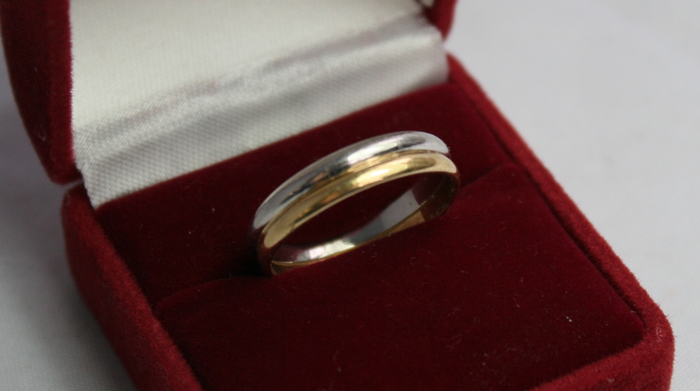 PLATINUM & GOLD WEDDING BAND -  two tone platinum & 18ct yellow gold wedding band weighing 4.1g.