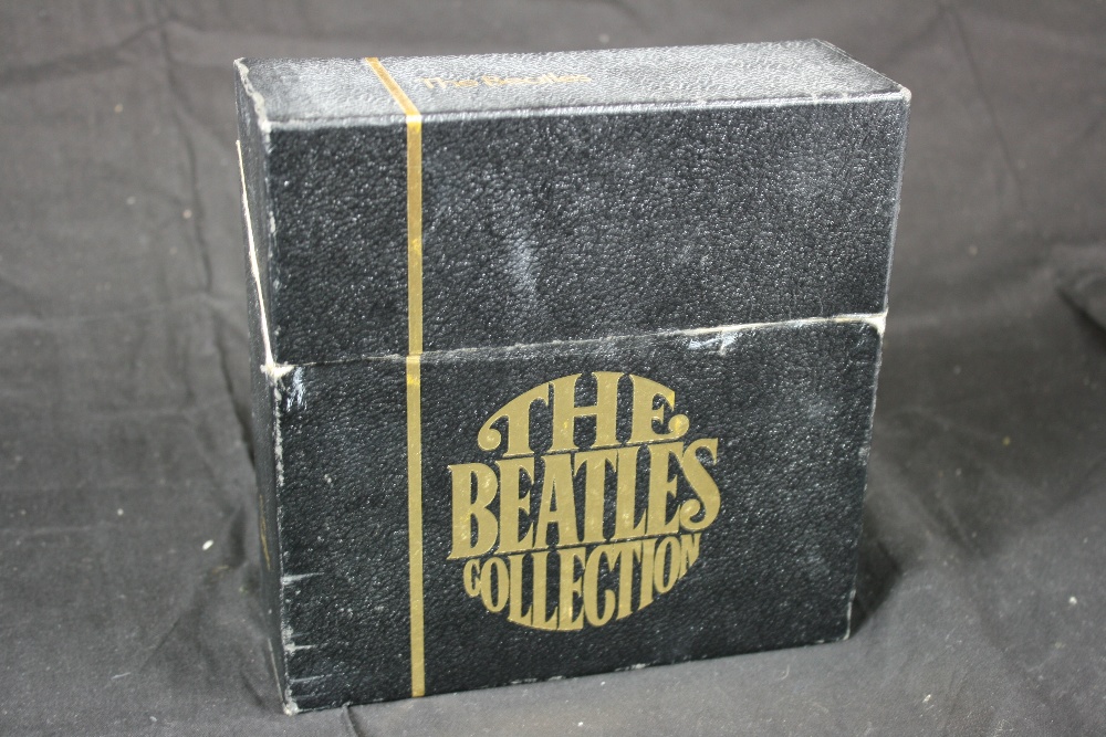 BEATLES COLLECTION BOX SET - black box with gold embossed lettering containing all 24 x 7" singles.