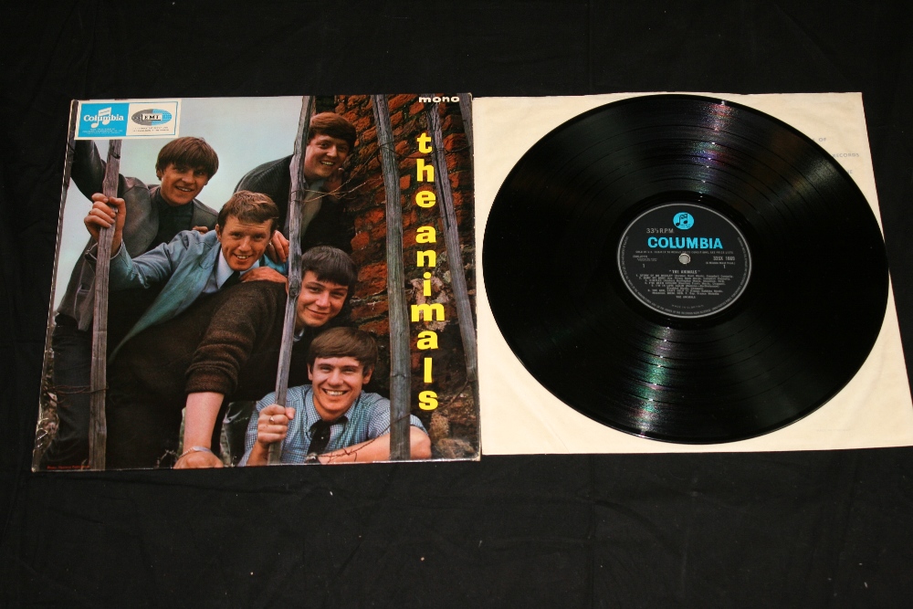 THE ANIMALS - self titled 1st press album by The Animals signed on the reverse "To Brian Best Wishes