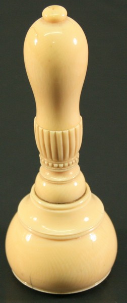 AN EDWARDIAN SILVER MOUNTED IVORY PRESENTATION STONEMASONS MALLET of turned form with reeded and