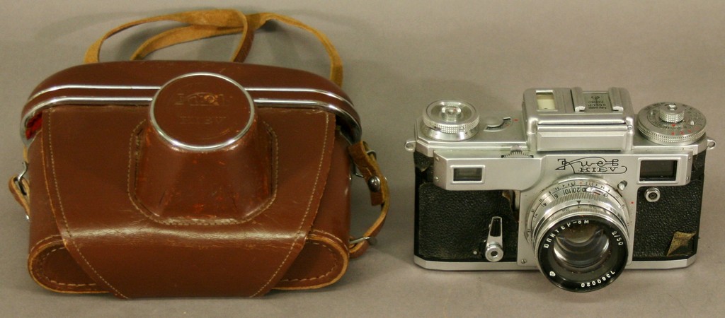 A KIEV CAMERA with 8m 2/50 lens and leather case.   Used condition^ inspection recommended.