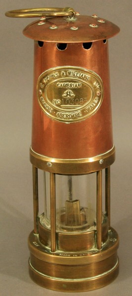 AN E.THOMAS & WILLIAMS LTD BRASS AND COPPER `CAMBRIAN` MINERS LAMP of typical form with applied